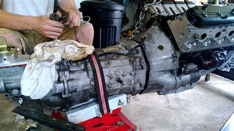 tranny|Pulling engine, with or without transmission attached